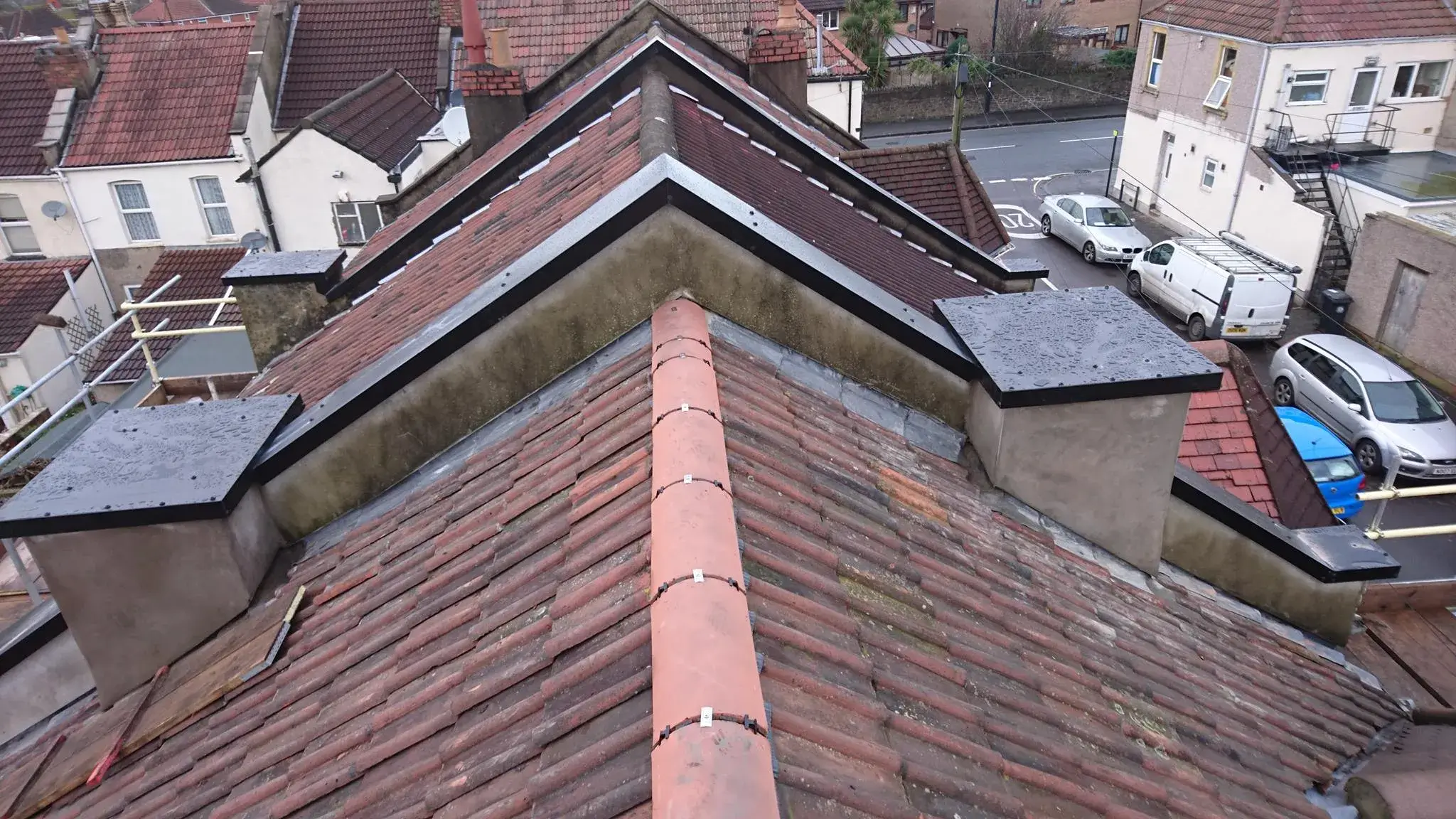 A view of a roof with a car parked on it.